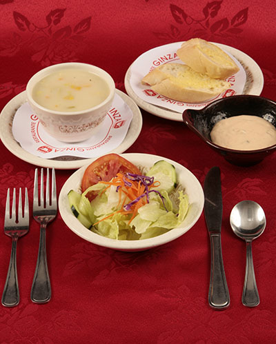 Sopa Del Día (Soup Of The Day), Pan Con Ajo (Garlic Bread), and Esalada Epecial (Special Salad). Photo by Jeff Lawrence